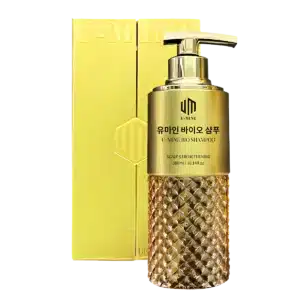 U-Mine Bio Shampoo – Luxurious gold bottle with a diamond-textured base, designed for advanced scalp and hair care.