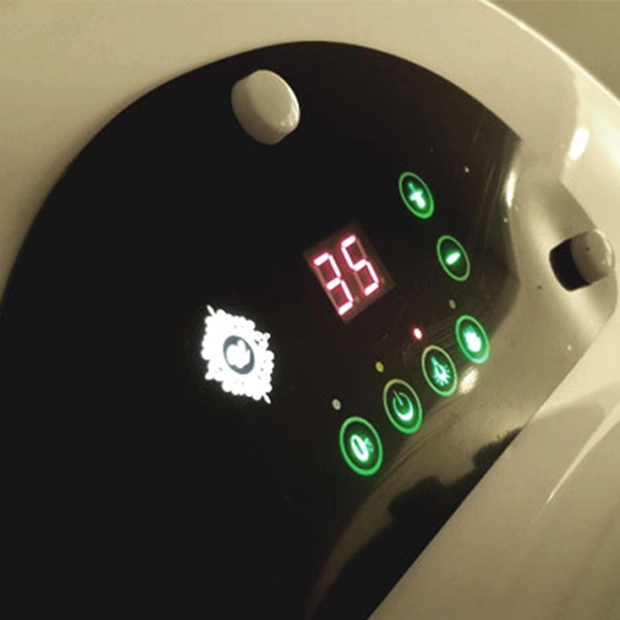 Close-up view of the main control panel on the U-Mine BodyJet steam spa, featuring an LED display and intuitive touch controls.